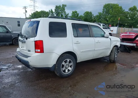 2011 Honda Pilot Touring из США, поврежденный, VIN 5FNYF4H94BB026309